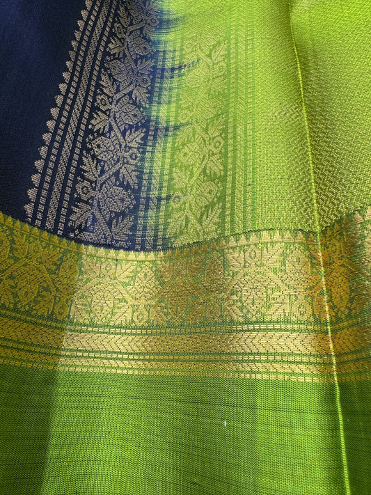 Dark Blue Kanchipuram Silk Saree With Parrot Green In Gold Zari